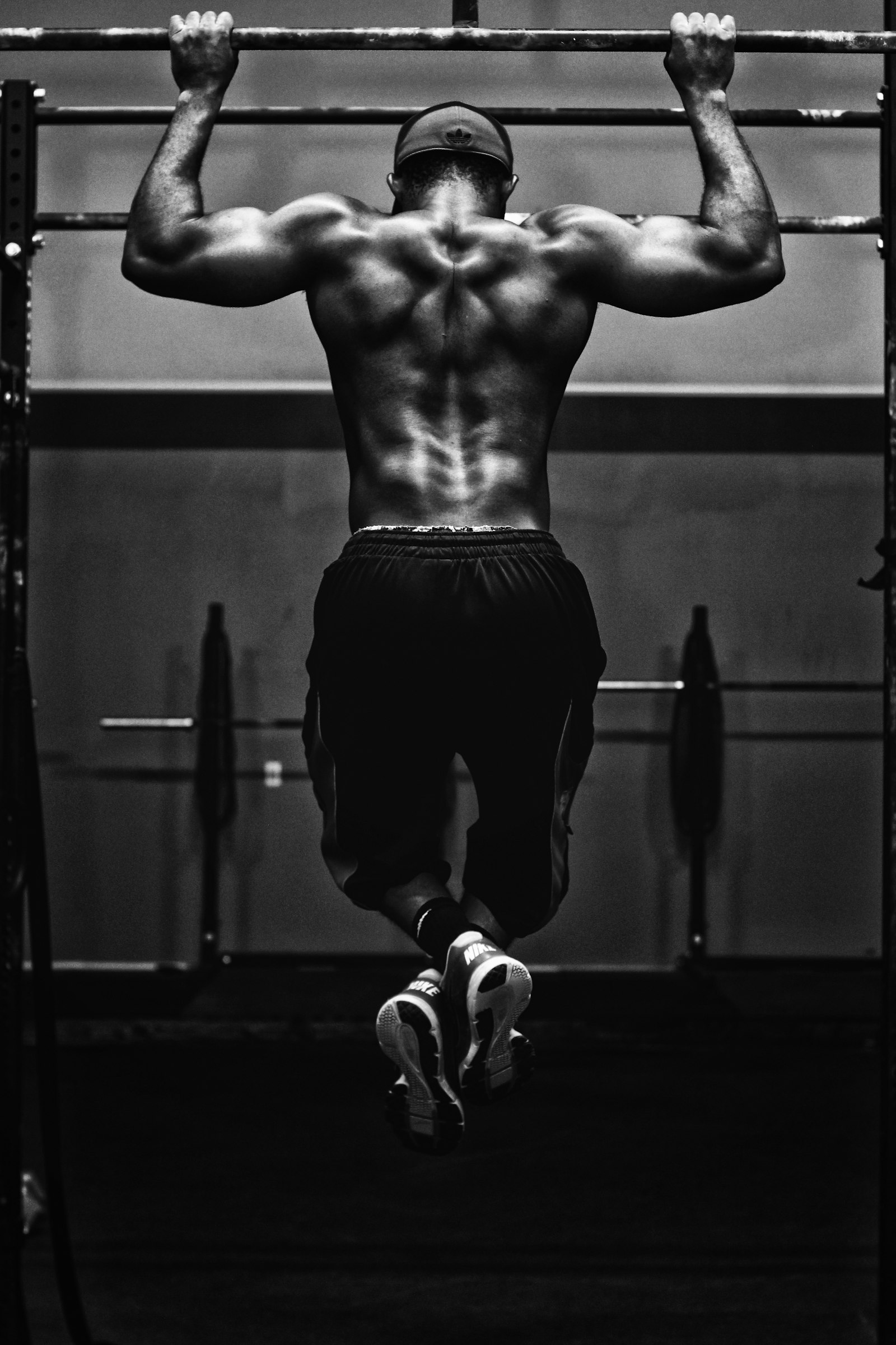 Hooded athlete from behind, monochrome