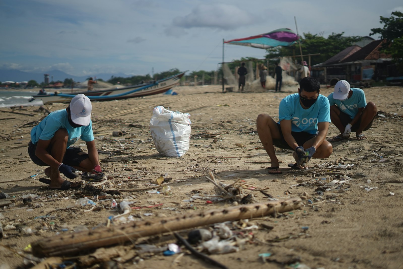 Volunteers collecting litter on the beach
