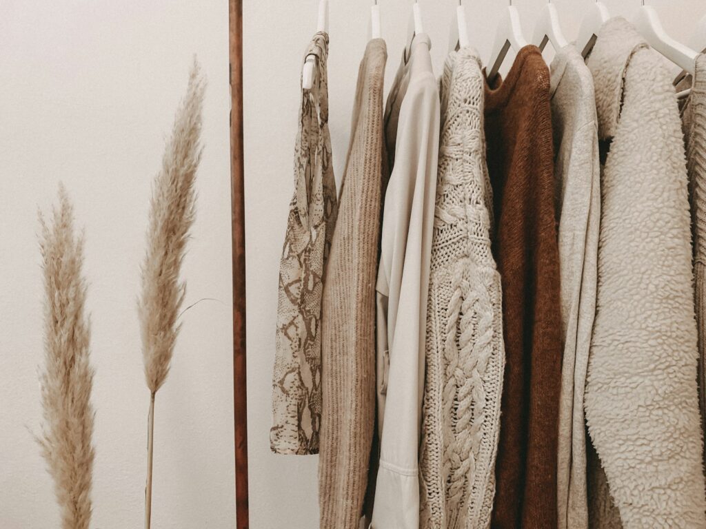 Neutral garments on a boutique rail