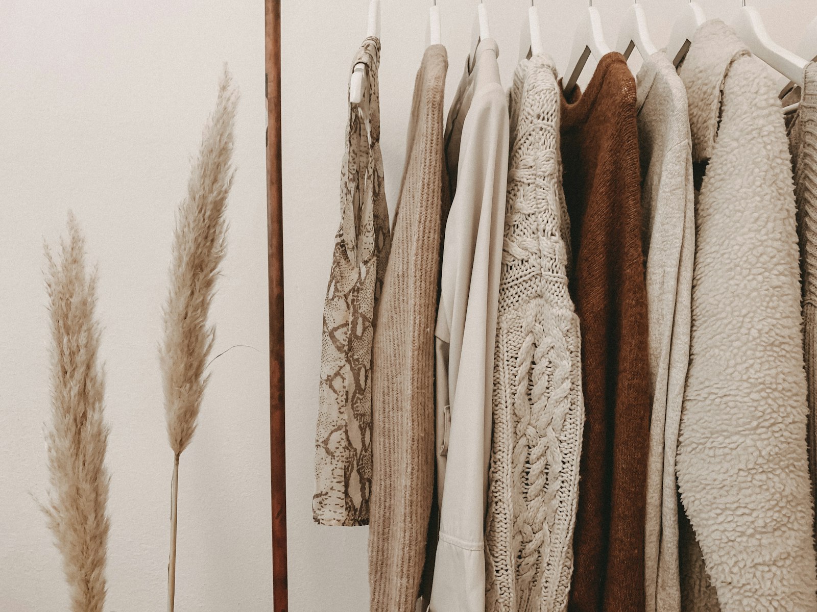 Neutral garments on a boutique rail