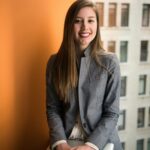 Businesswoman in warm window light