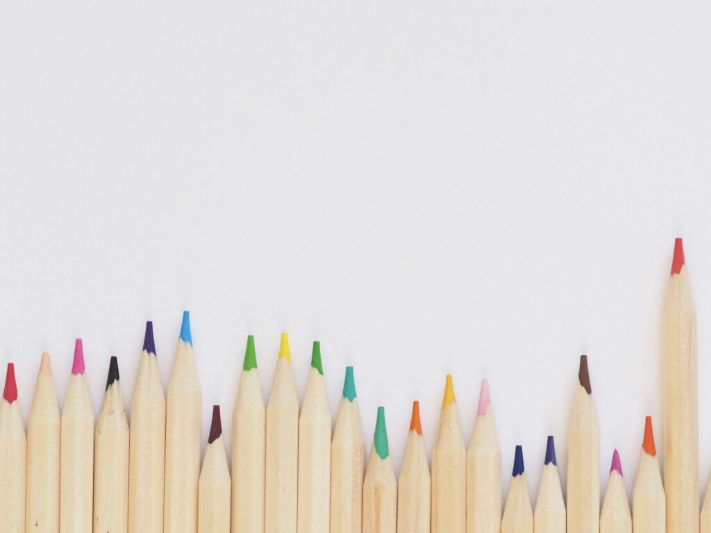 Colored pencils in a row