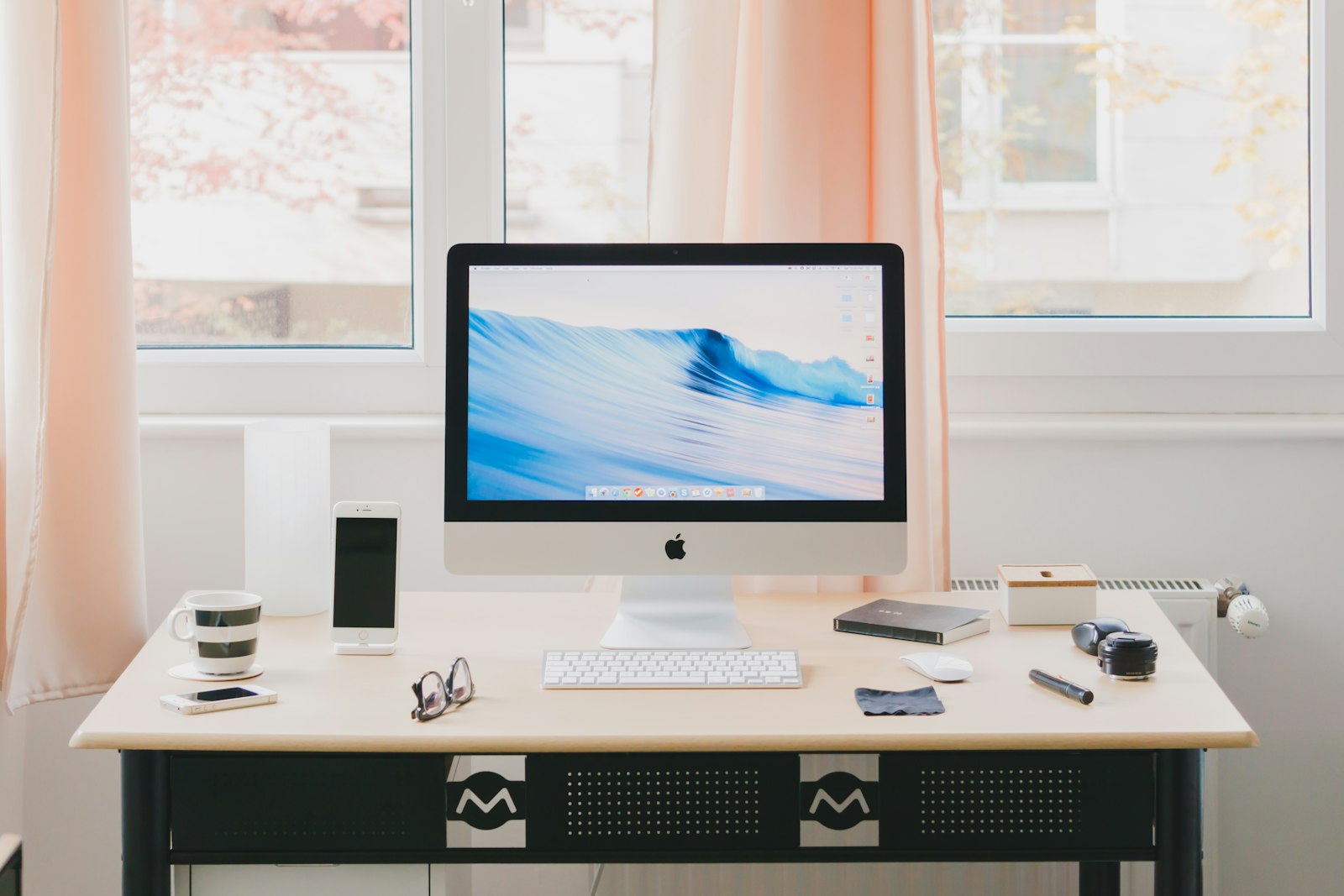 Desktop computer on a bright home office desk