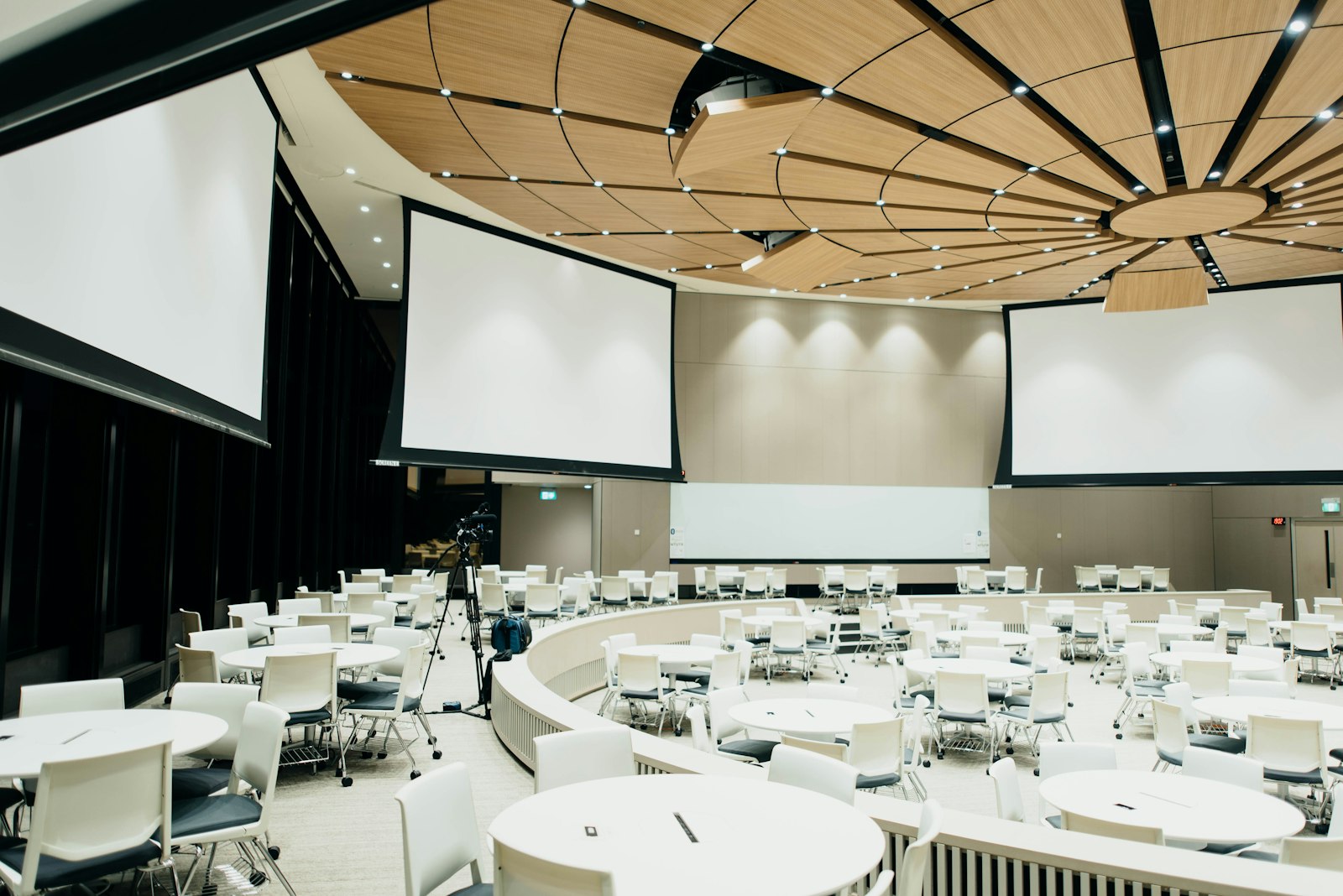 Conference hall set with round tables
