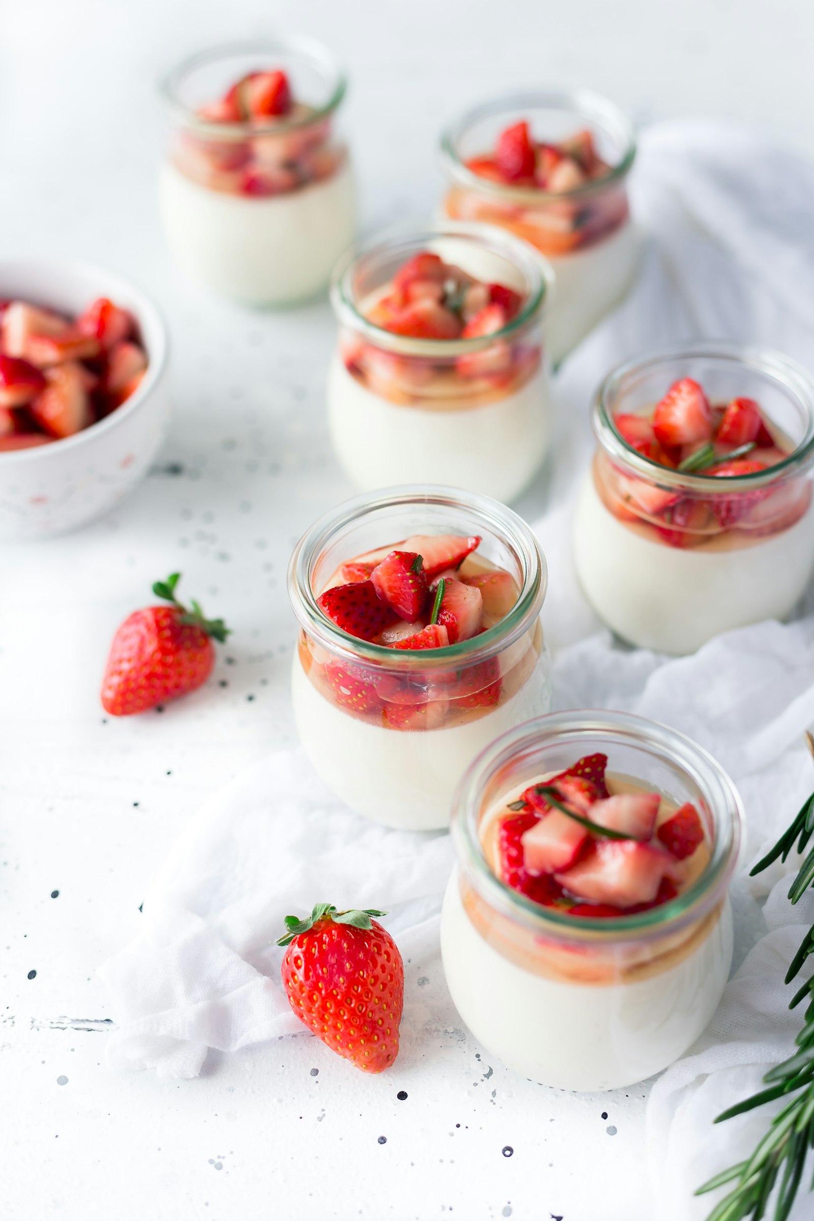 Panna cotta jars topped with strawberries