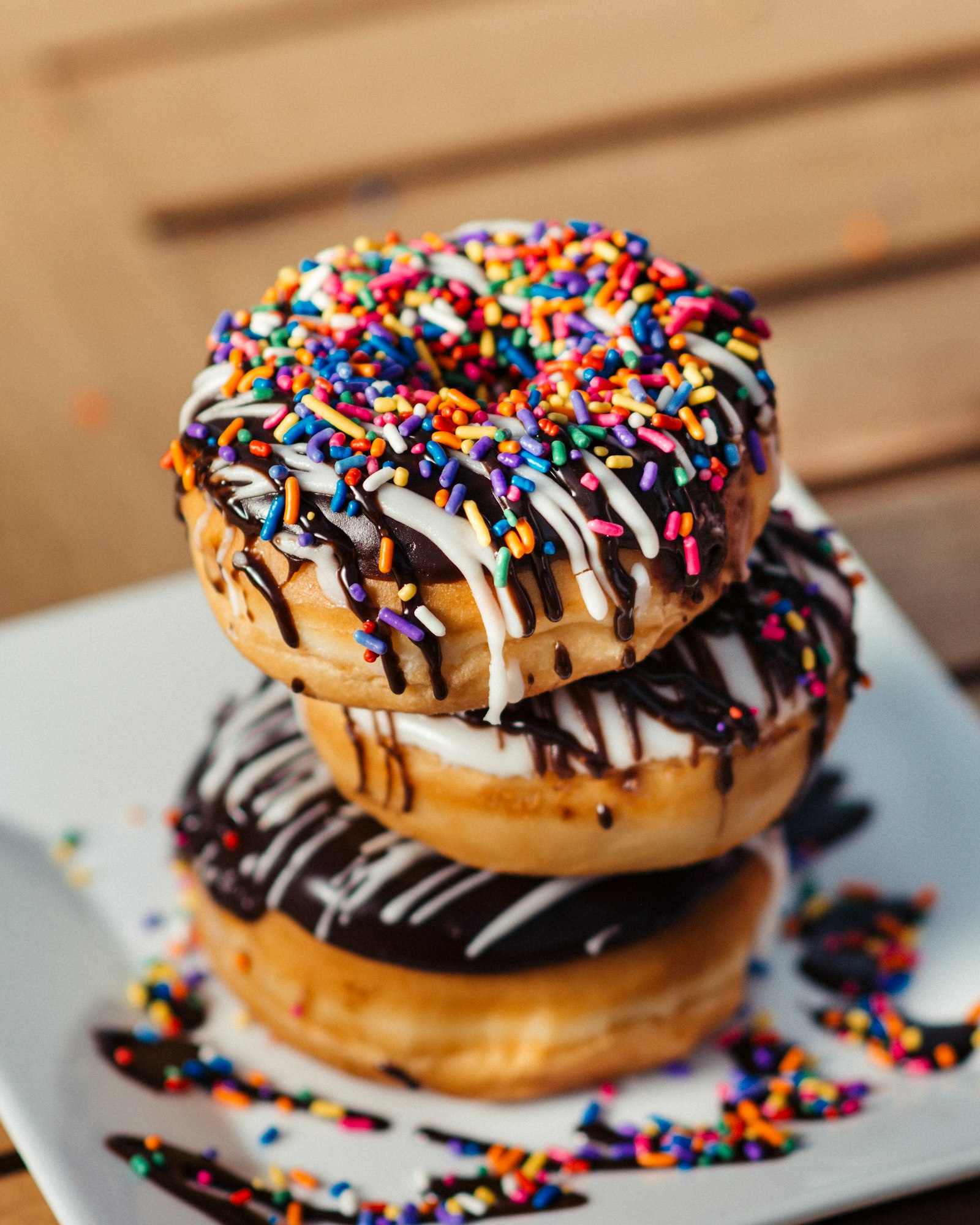Stacked donuts with sprinkles