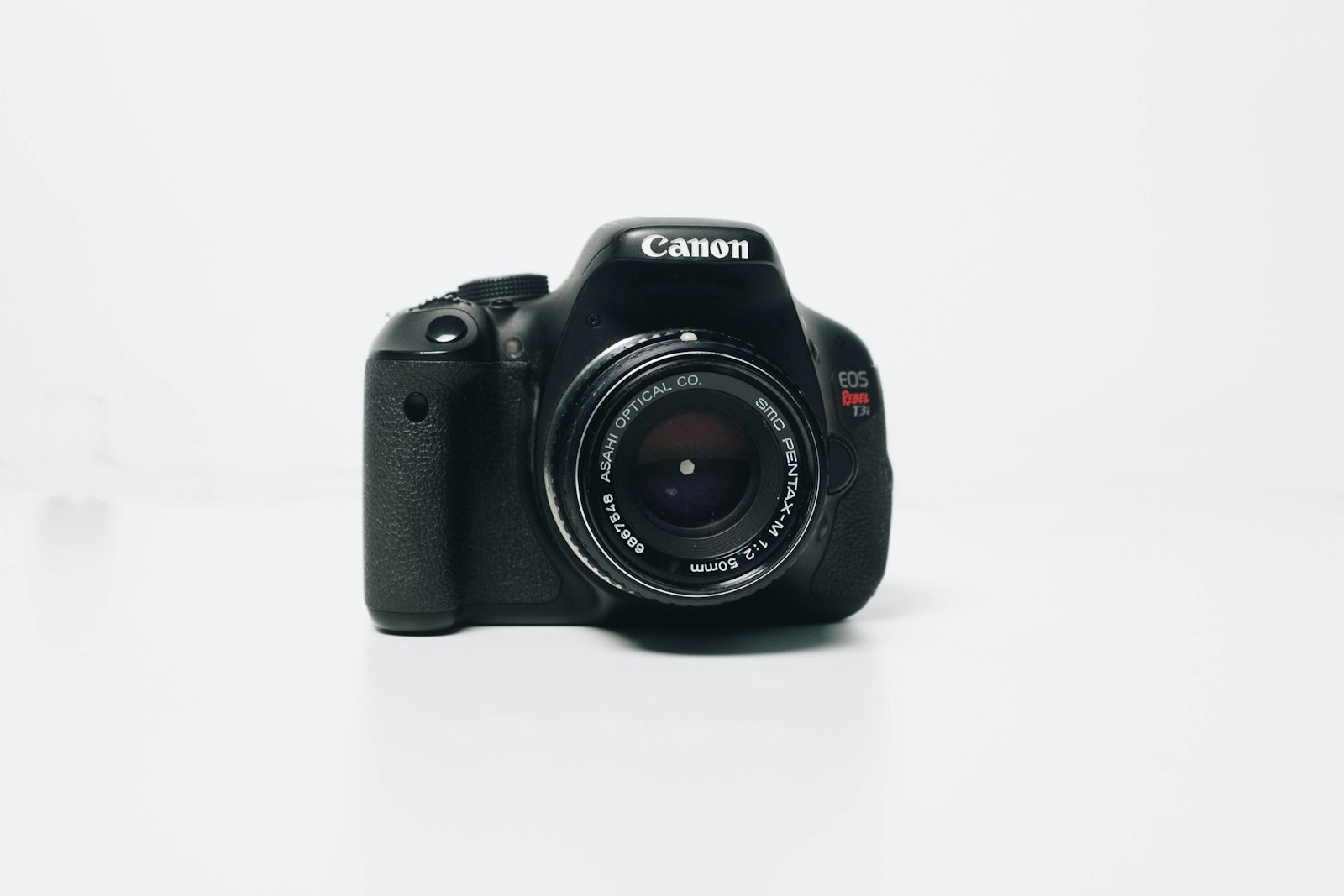 DSLR camera on a white background