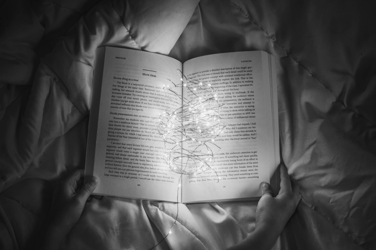 Open book glowing in the dark