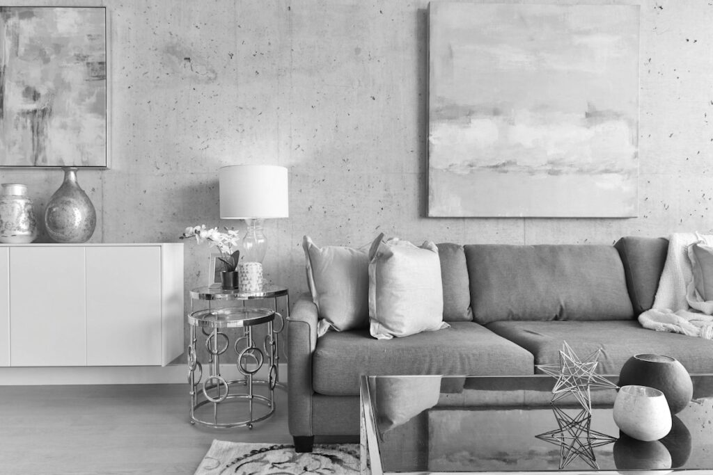 Grey sofa living room with abstract paintings