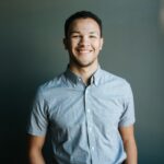 Smiling man in a blue shirt