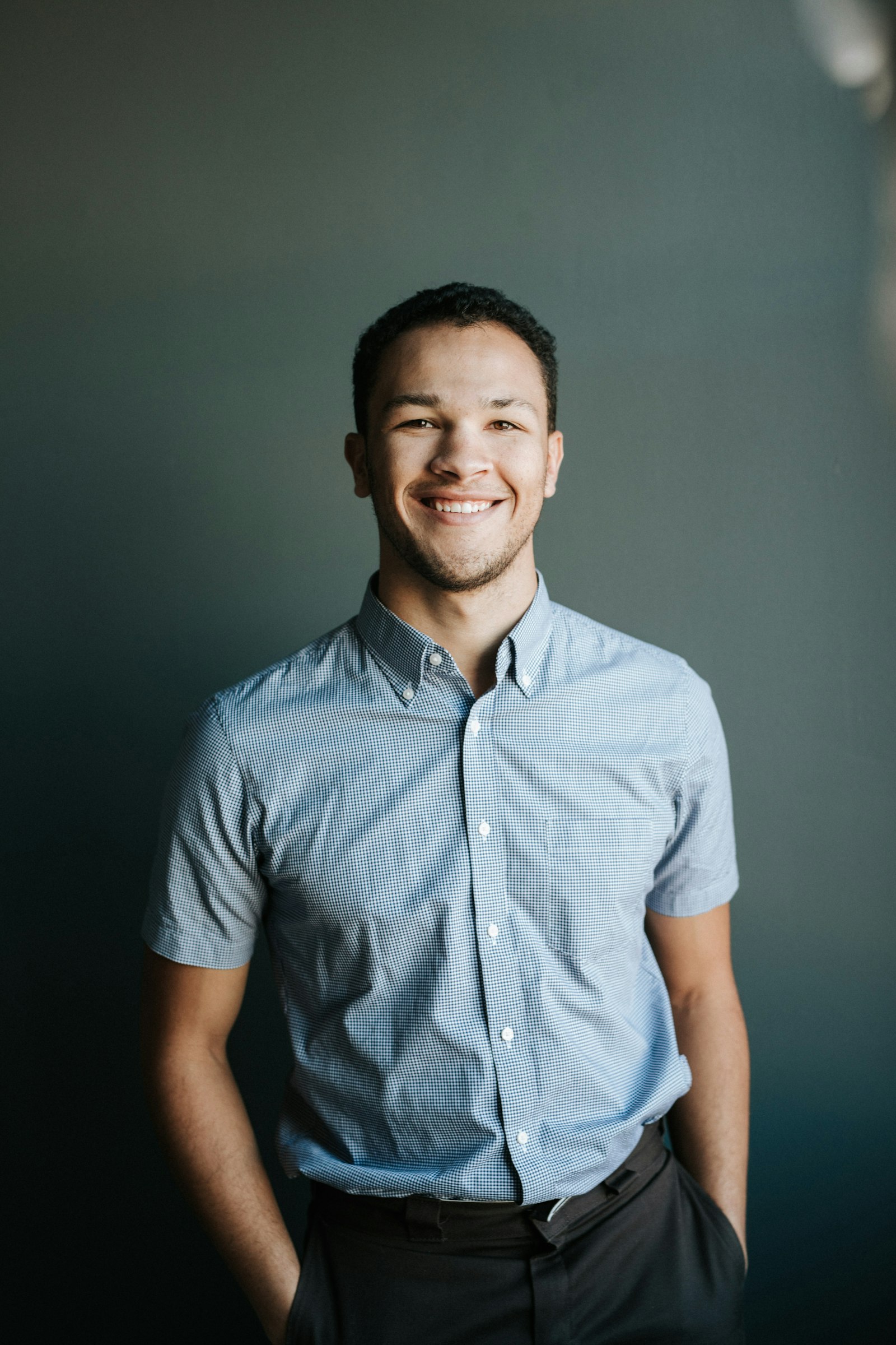 Smiling man in a blue shirt