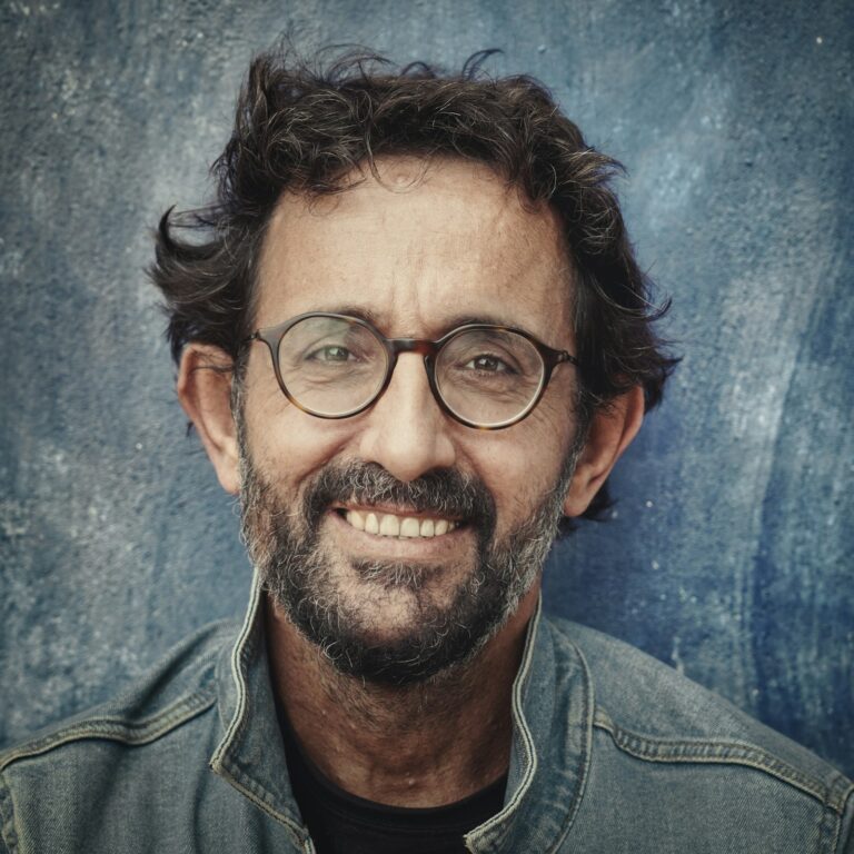 Mature man with glasses and a grey beard