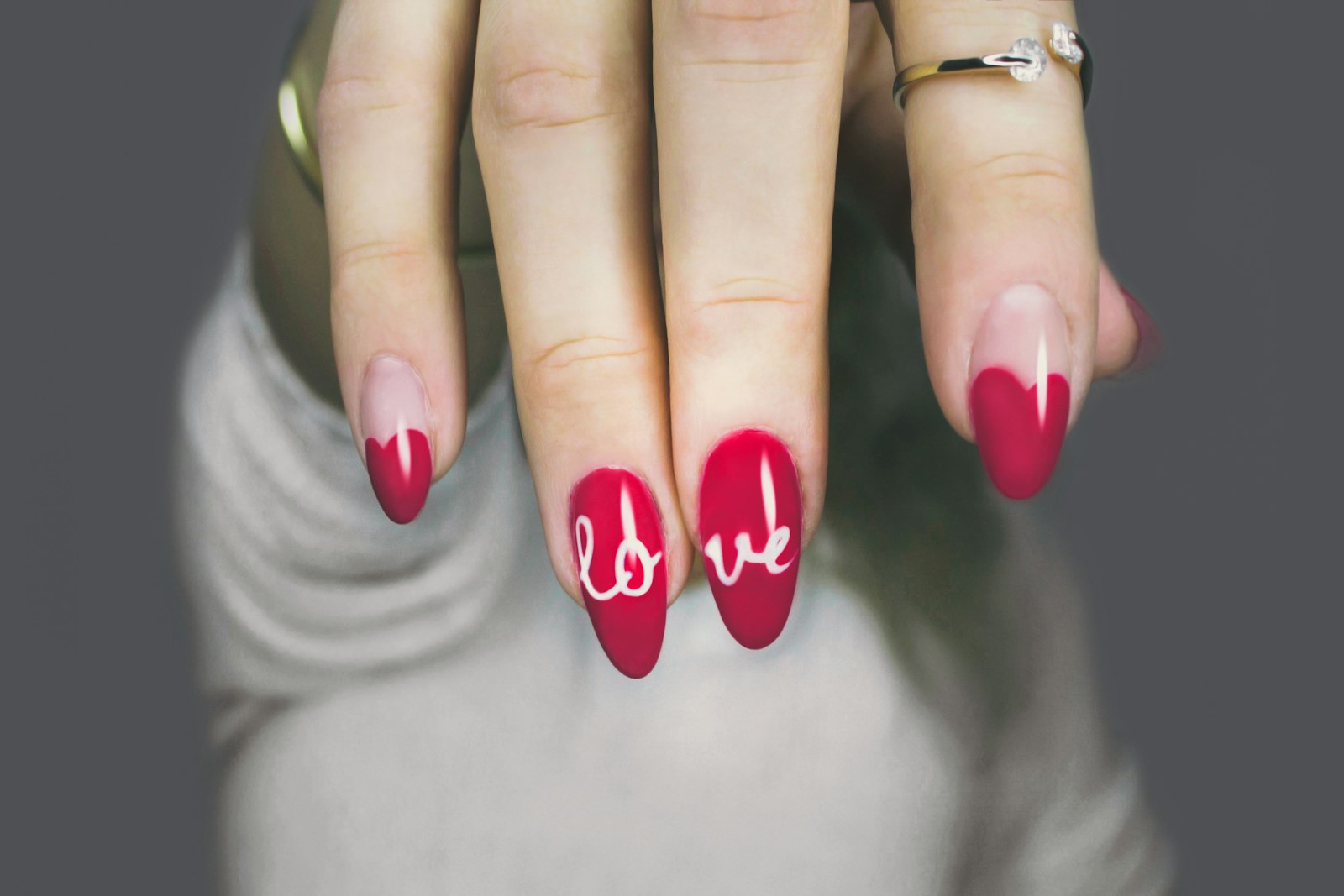 Manicured nails with red nail art