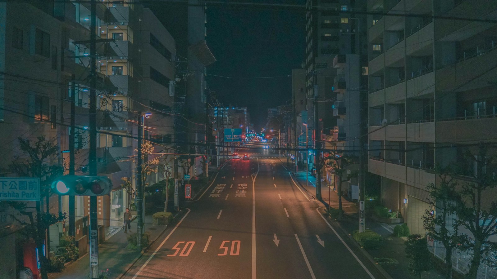 Neon-lit street at night