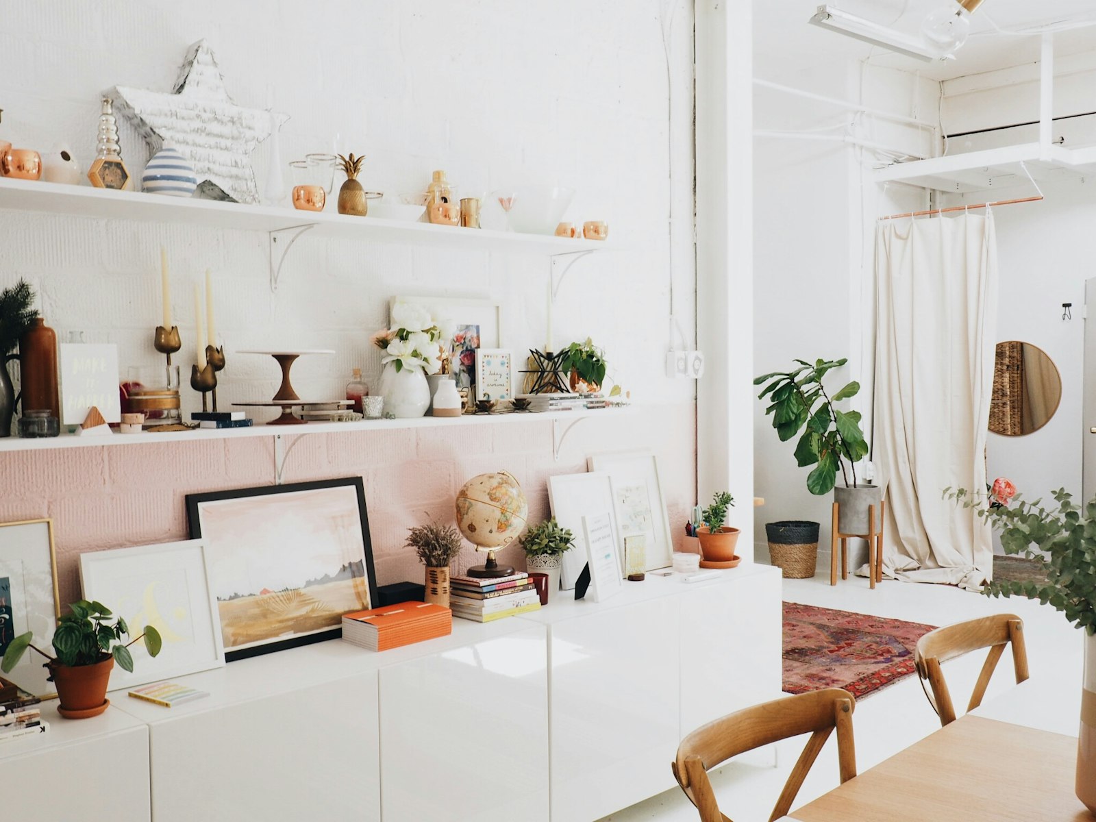 Bright interior with framed art and plants