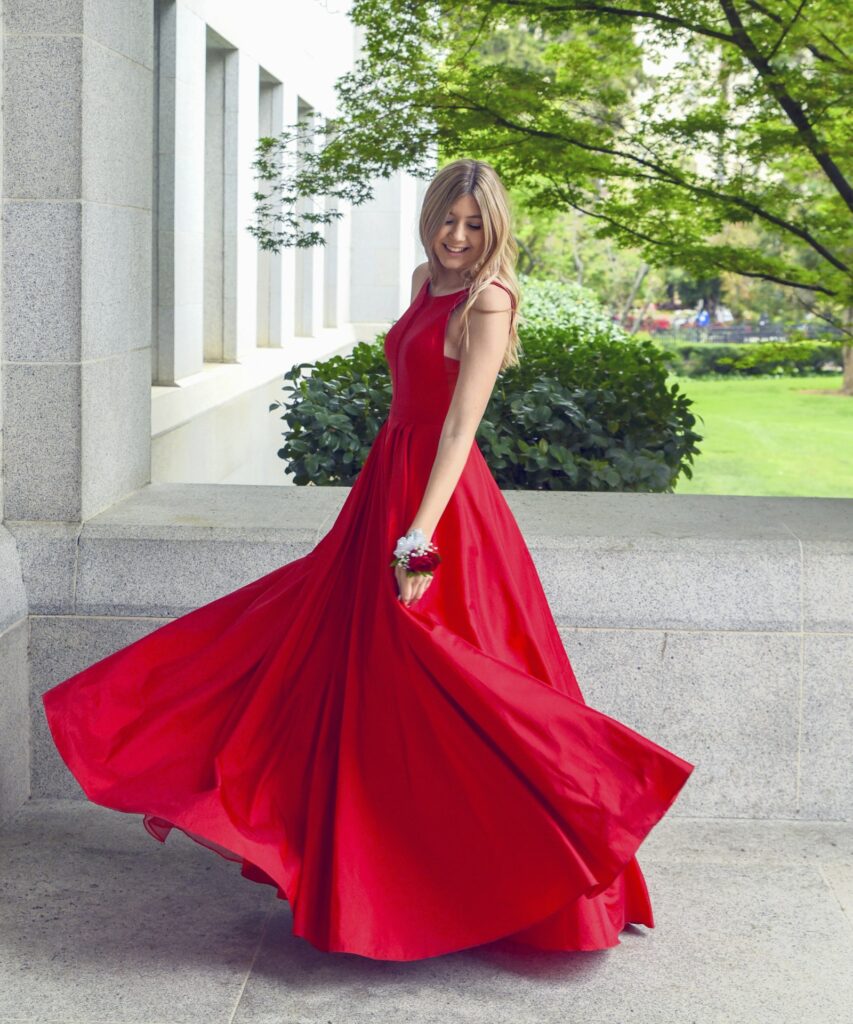 Model in a flowing red gown