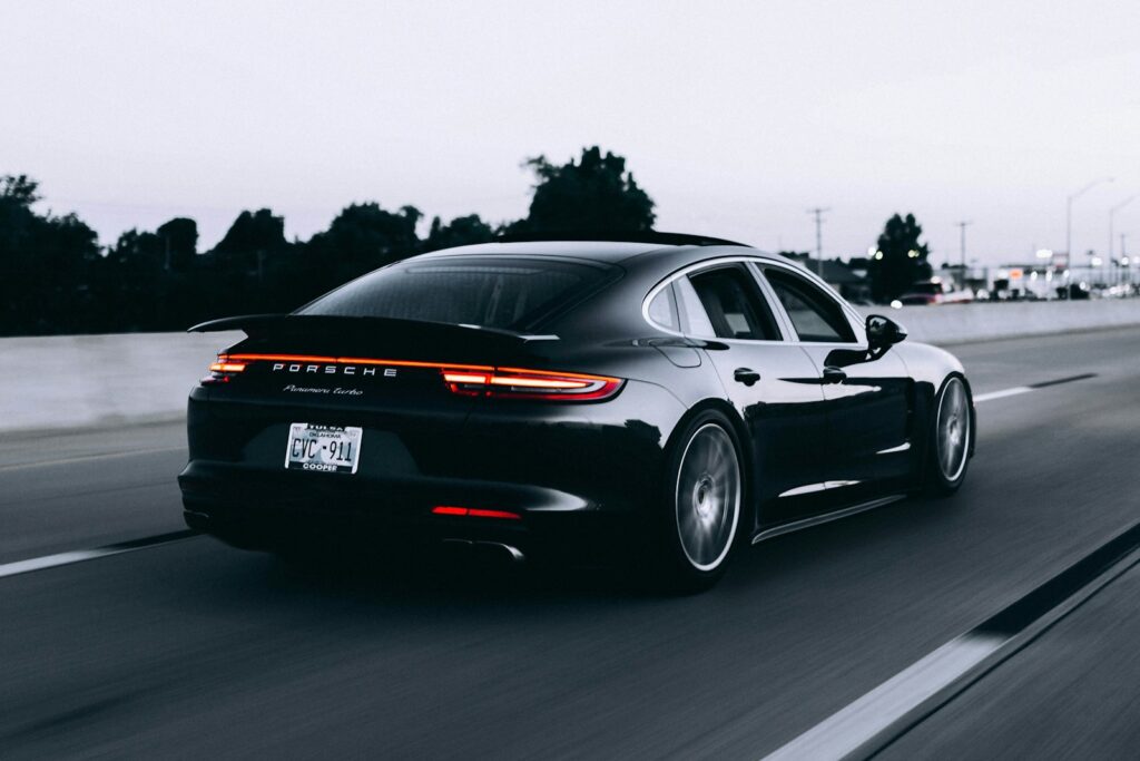 Black sedan on the highway