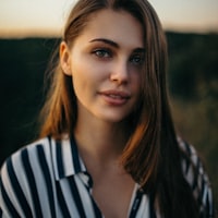 Woman in a striped shirt, studio portrait