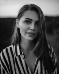 Woman in a striped shirt, studio portrait